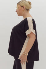 Entro Black ribbed textured knit top with cream trim