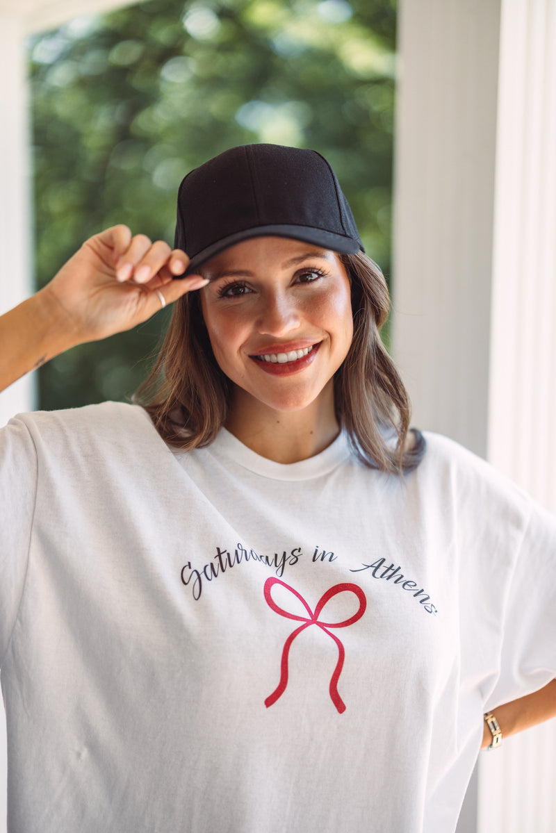 women's black bow back trucker hat