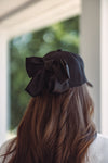 women's black bow back trucker hat