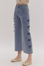 Entro Blue cropped denim pants with bow tie trim down the sides