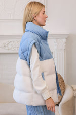 Main Strip Light blue quilted puffer vest with off white fleece colorblock