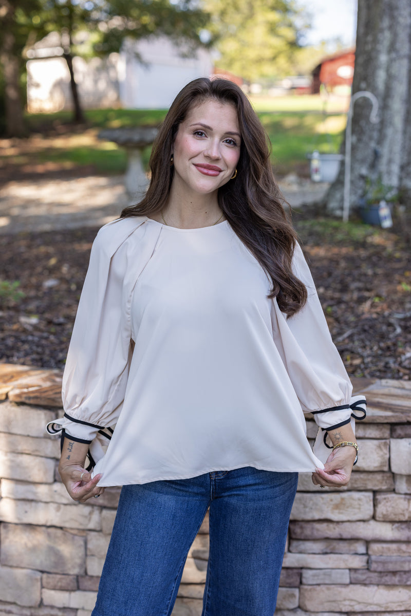 cream black trim bow sleeve top