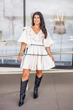 cream black ruffle babydoll dress