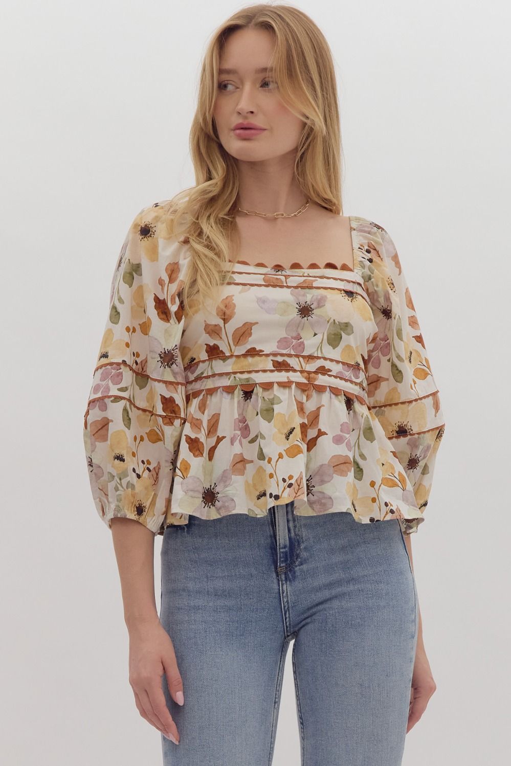 Entro Cream floral print peplum top with brown scalloped ric rac trim throughout