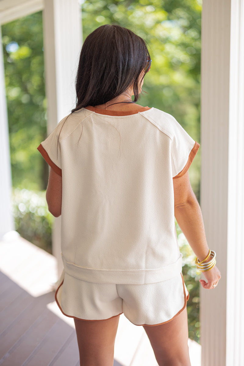 cream textured drawstring shorts