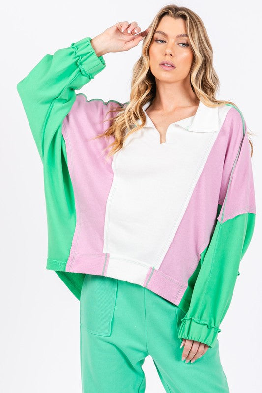 Green, lavender, and cream colorblock french terry knit collared pullover top
