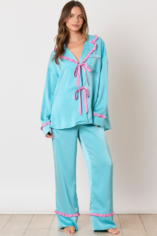 Peach Love California Blue and pink satin pajama pants and top set with bow ties and ruffle details