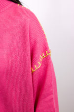 pink turtleneck stitch trim sweater