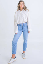 Karlie Tan and white striped button down seersucker bubble hem top