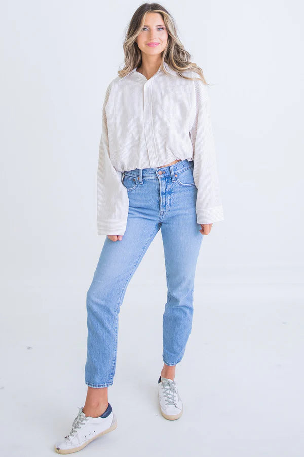 Karlie Tan and white striped button down seersucker bubble hem top