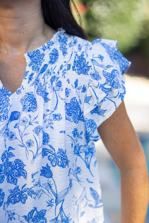 umgee blue floral print top