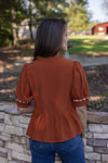 rust ricrac trim peplum top