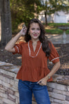 rust ricrac trim peplum top